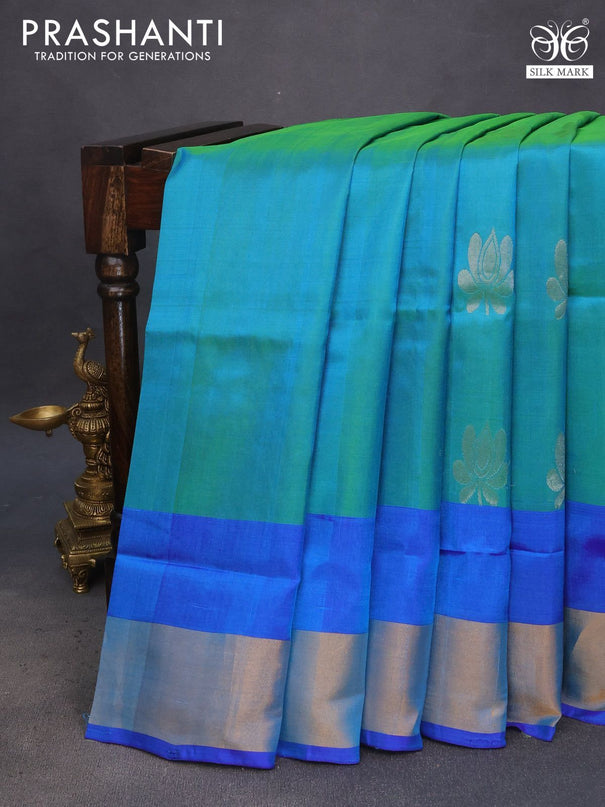 Pure uppada silk saree dual shade of teal blue and blue with silver & gold zari woven buttas and zari woven border