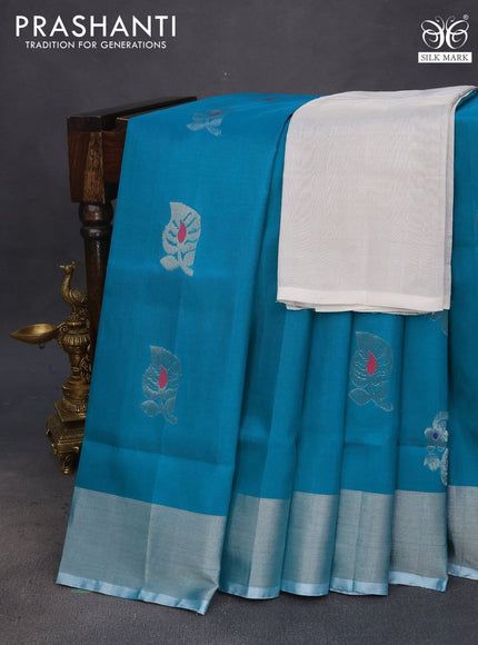 Pure uppada silk saree teal blue shade with thread & silver zari woven buttas and silver zari woven border