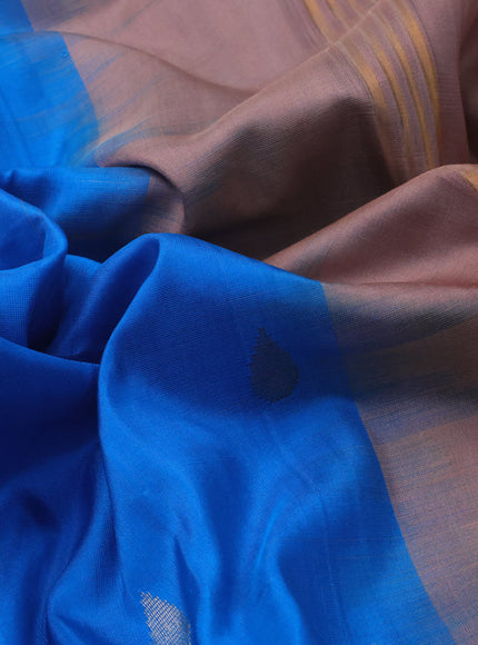 Pure uppada silk saree cs blue and pastel peach shade with silver & gold zari woven tilak buttas and long zari woven border