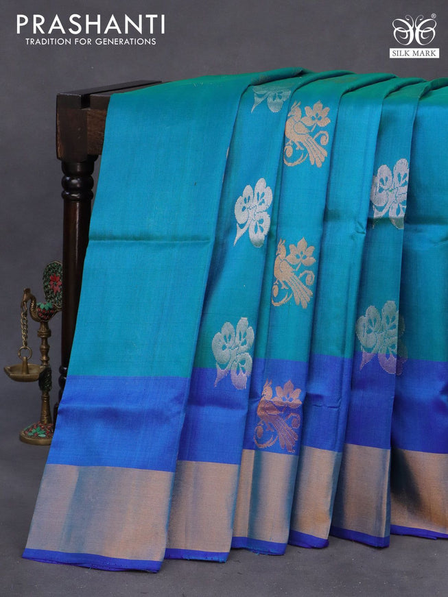 Pure uppada silk saree dual shade of teal blue and blue with silver & gold zari woven buttas and zari woven border