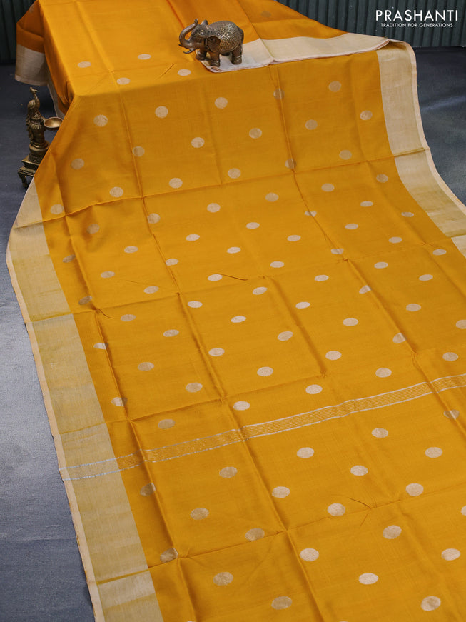 Pure uppada silk saree yellow with silver zari woven coin buttas and silver zari woven border