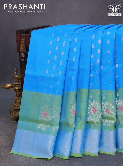 Pure uppada silk saree cs blue and light green with allover silver zari woven tilak buttas and rich zari woven border