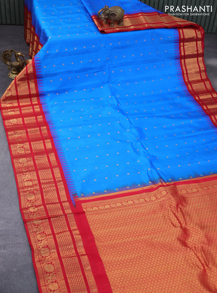 Pure gadwal silk saree cs blue and red with zari woven buttas and temple deisgn zari woven border