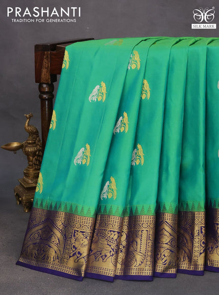 Pure gadwal silk saree light green and blue with silver & zari woven buttas and temple deisgn zari woven border