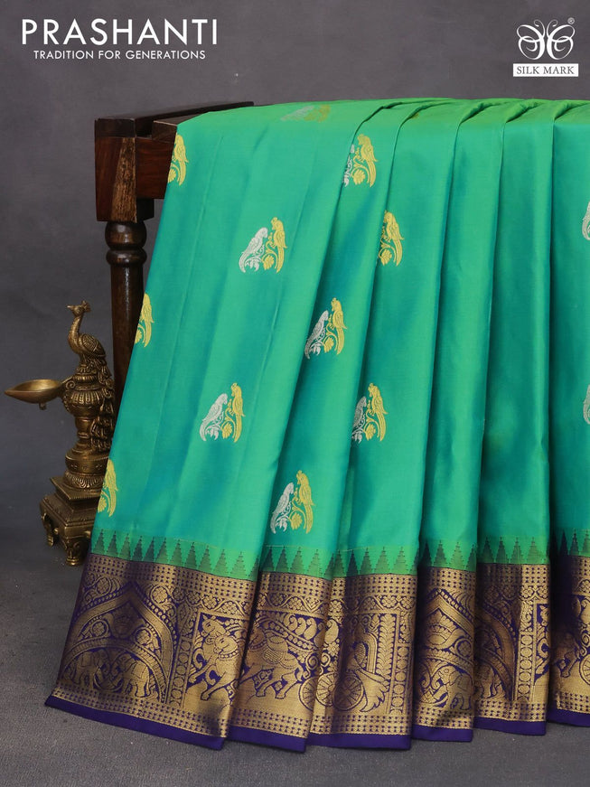 Pure gadwal silk saree light green and blue with silver & zari woven buttas and temple deisgn zari woven border