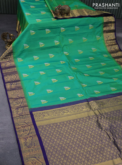 Pure gadwal silk saree light green and blue with silver & zari woven buttas and temple deisgn zari woven border