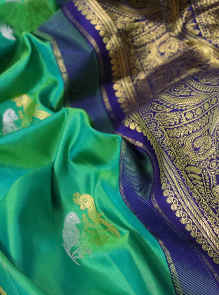 Pure gadwal silk saree light green and blue with silver & zari woven buttas and temple deisgn zari woven border