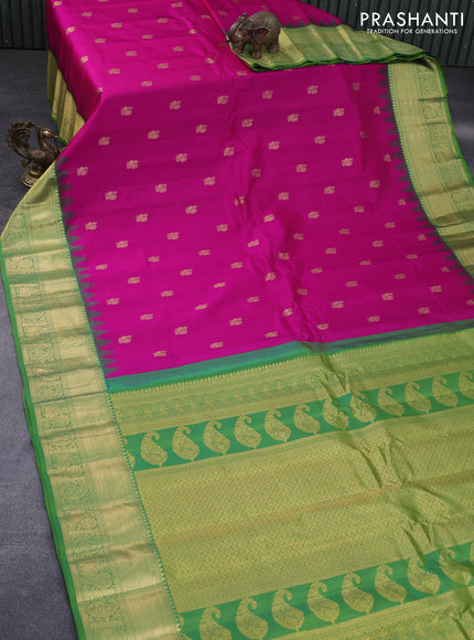 Pure gadwal silk saree pink and green with annam zari woven buttas and temple deisgn zari woven border