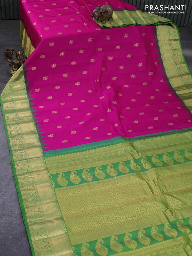 Pure gadwal silk saree pink and green with annam zari woven buttas and temple deisgn zari woven border