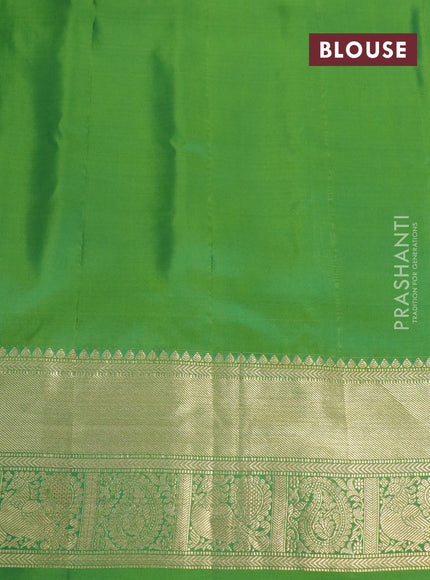 Pure gadwal silk saree pink and green with annam zari woven buttas and temple deisgn zari woven border