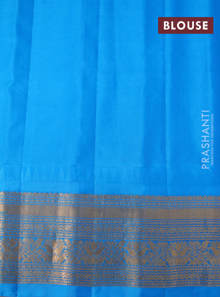 Pure gadwal silk saree pink and cs blue with zari woven buttas and temple deisgn zari woven border