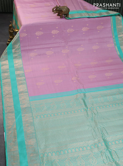 Pure gadwal silk saree mild purple and teal green shade with allover zari weaves and rettapet zari woven border