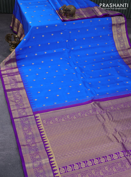 Pure gadwal silk saree blue and violet with zari woven buttas and temple deisgn zari woven border