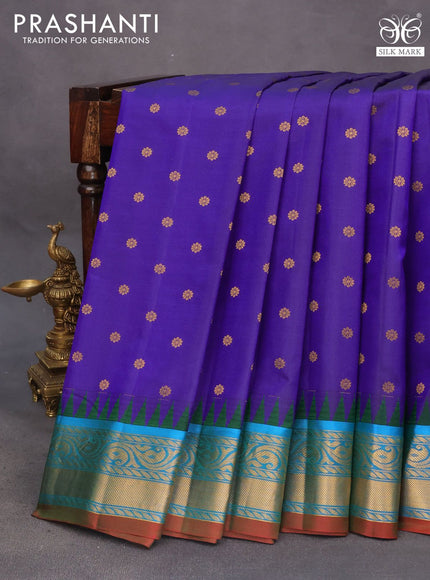 Pure gadwal silk saree blue and dual shade of teal blue with zari woven buttas and temple deisgn zari woven border