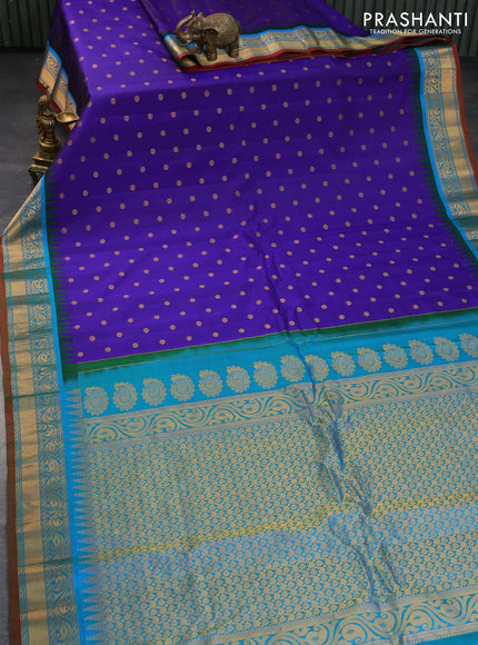 Pure gadwal silk saree blue and dual shade of teal blue with zari woven buttas and temple deisgn zari woven border