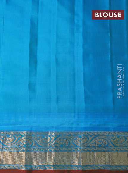 Pure gadwal silk saree blue and dual shade of teal blue with zari woven buttas and temple deisgn zari woven border