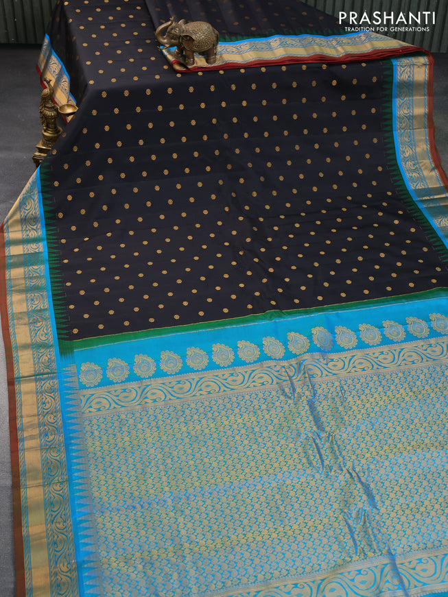 Pure gadwal silk saree black and dual shade of teal blue with zari woven buttas and temple deisgn zari woven border