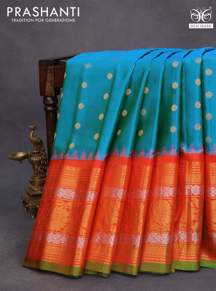 Pure gadwal silk saree teal blue and orange with zari woven buttas and temple deisgn long zari woven border