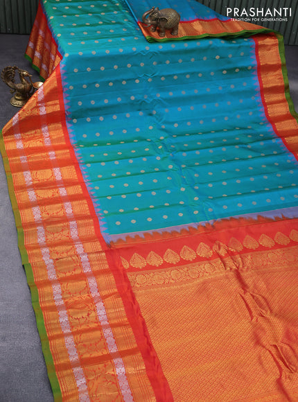 Pure gadwal silk saree teal blue and orange with zari woven buttas and temple deisgn long zari woven border