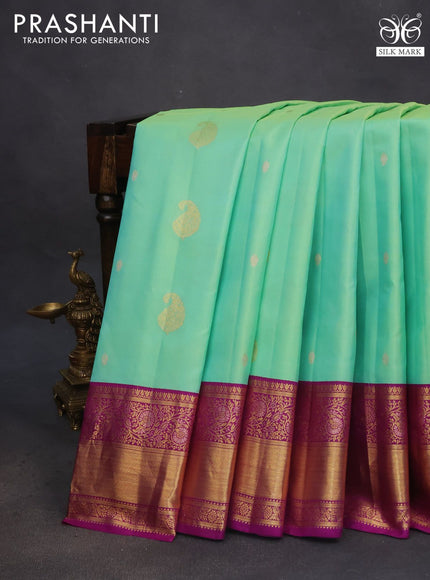 Pure gadwal silk saree teal green shade and purple with zari woven buttas and zari woven border