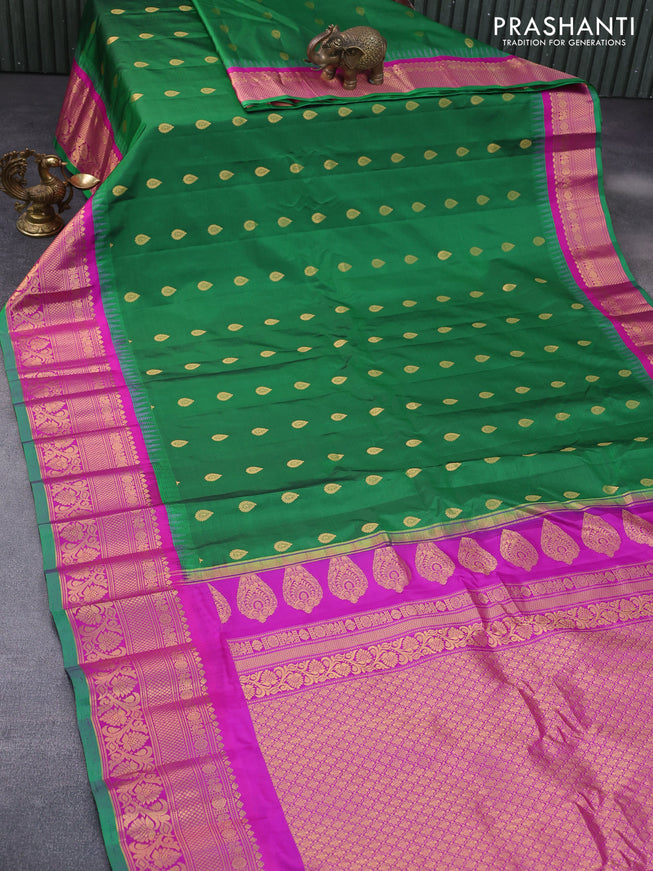 Pure gadwal silk saree green and magenta pink with zari woven buttas and temple deisgn zari woven border