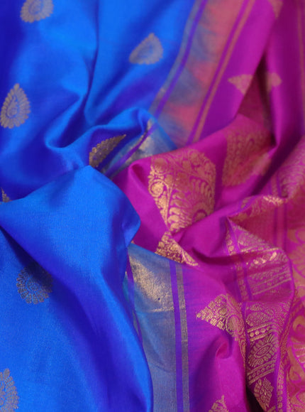 Pure gadwal silk saree blue and pink with zari woven buttas and temple deisgn zari woven border