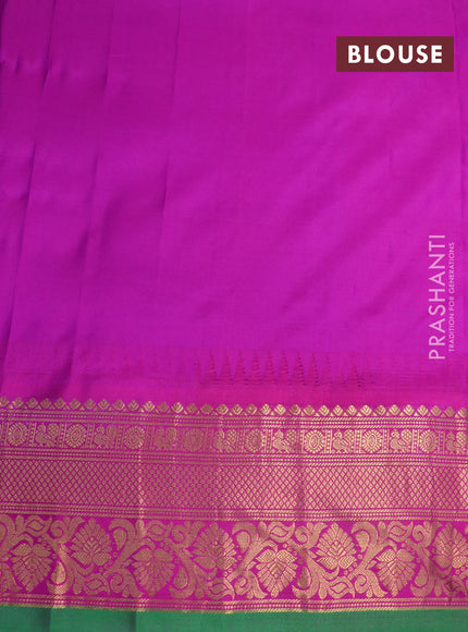 Pure gadwal silk saree blue and pink with zari woven buttas and temple deisgn zari woven border