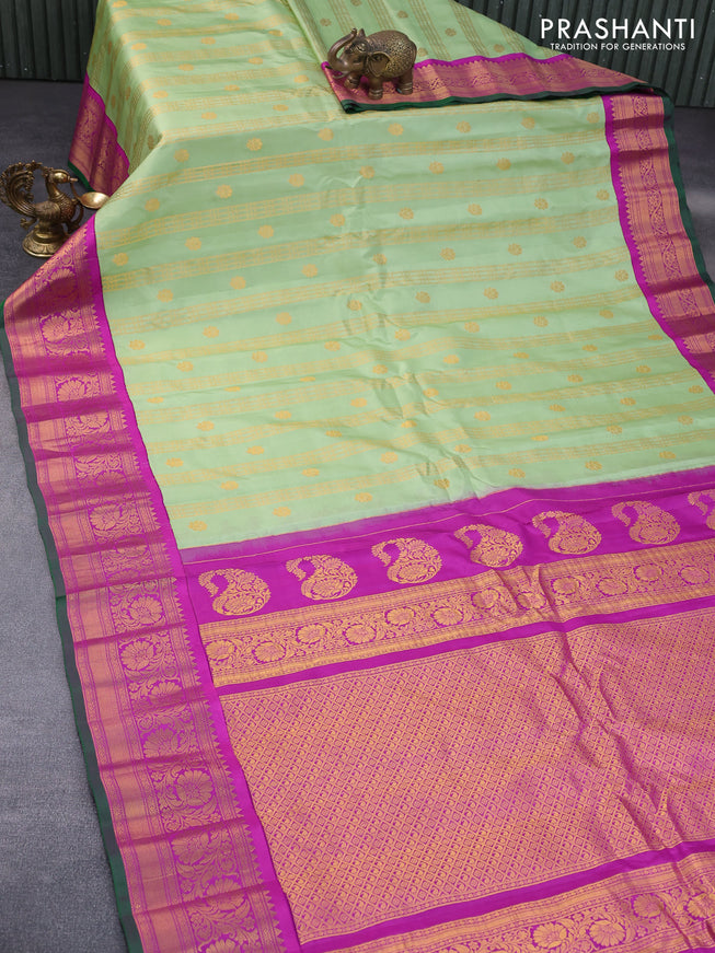 Pure gadwal silk saree pista green and purple with zari woven floral buttas and zari woven border