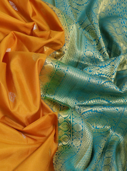 Pure gadwal silk saree mustard yellow and teal blue with zari woven buttas and temple deisgn zari woven border