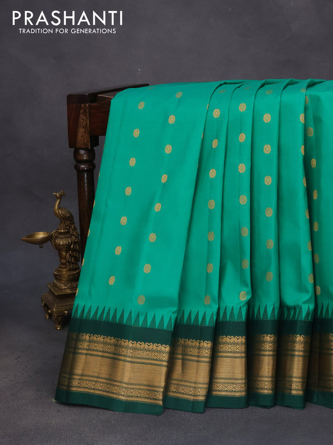 Pure gadwal silk saree green with zari woven buttas and temple deisgn ganga jamuna border