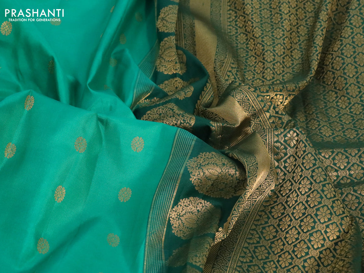 Pure gadwal silk saree green with zari woven buttas and temple deisgn ganga jamuna border