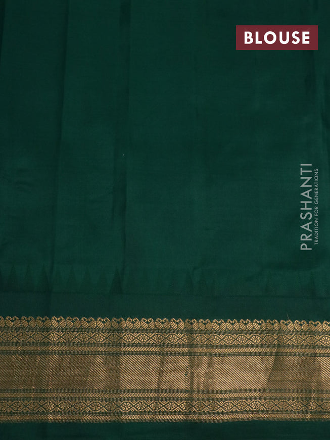 Pure gadwal silk saree green with zari woven buttas and temple deisgn ganga jamuna border