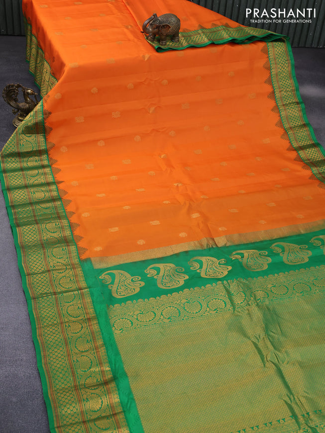 Pure gadwal silk saree orange and green with zari woven buttas and temple deisgn zari woven border