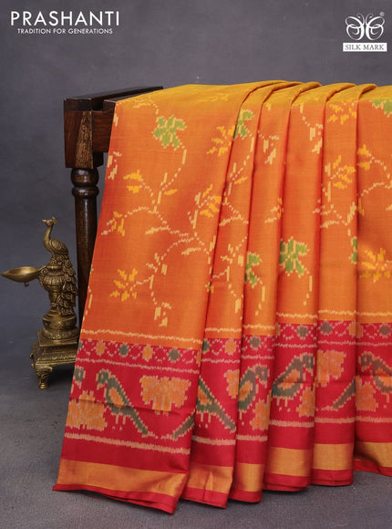 Rajkot patola silk saree dual shade of dark mustard and maroon with allover ikat weaves and ikat woven zari border