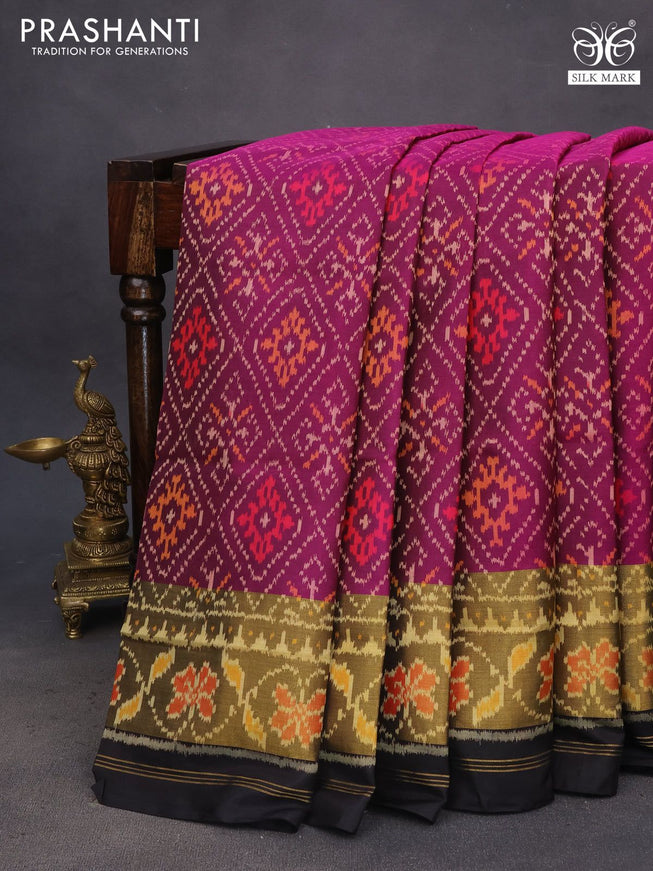 Rajkot patola silk saree purple and black with allover ikat weaves and ikat woven zari border