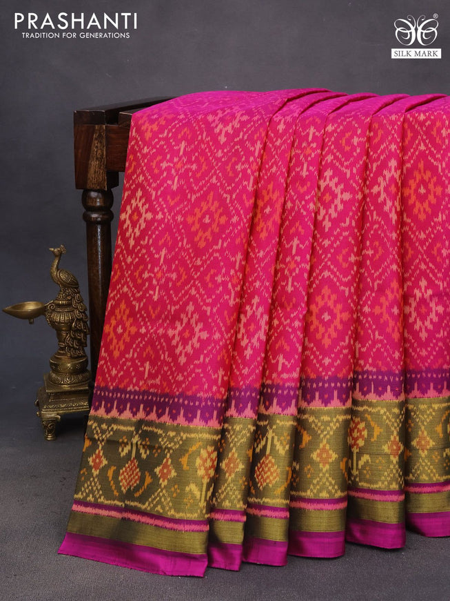 Rajkot patola silk saree magenta pink and purple with allover ikat weaves and ikat woven zari border