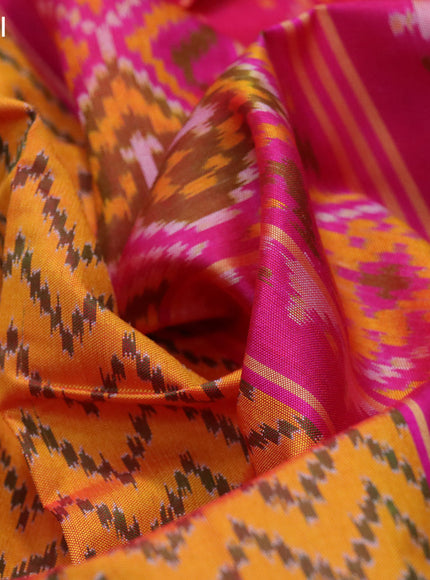 Rajkot patola silk saree mango yellow and pink with allover zig zag ikat weaves and ikat woven zari border