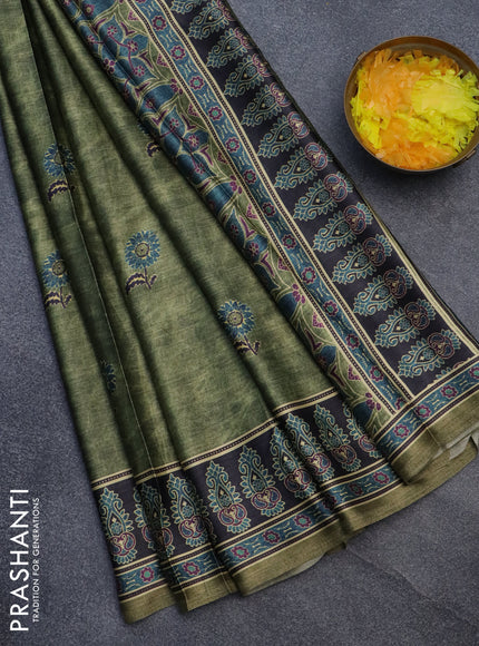 Semi modal saree green shade with floral buttas and printed border