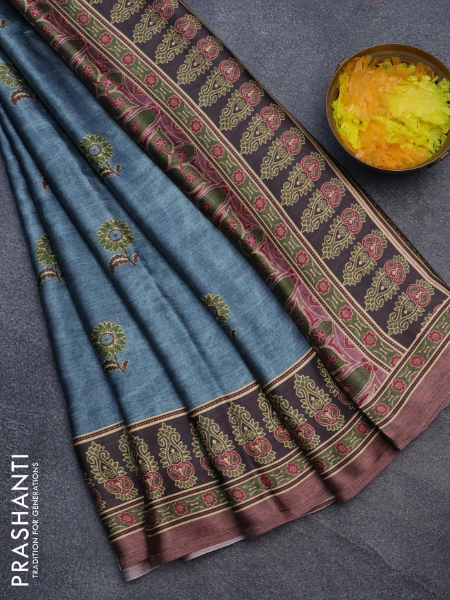 Semi modal saree blue shade and brown with floral buttas and printed border