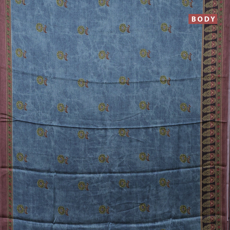 Semi modal saree blue shade and brown with floral buttas and printed border