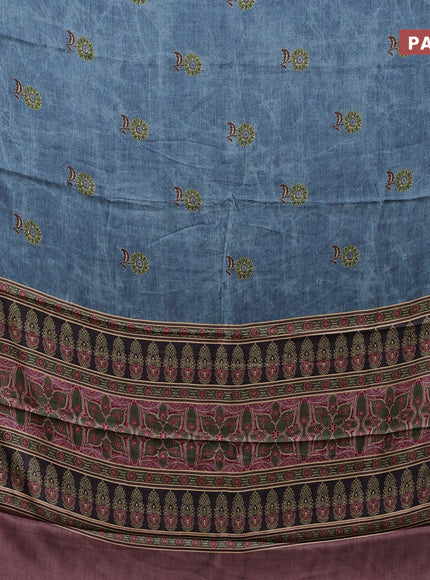 Semi modal saree blue shade and brown with floral buttas and printed border