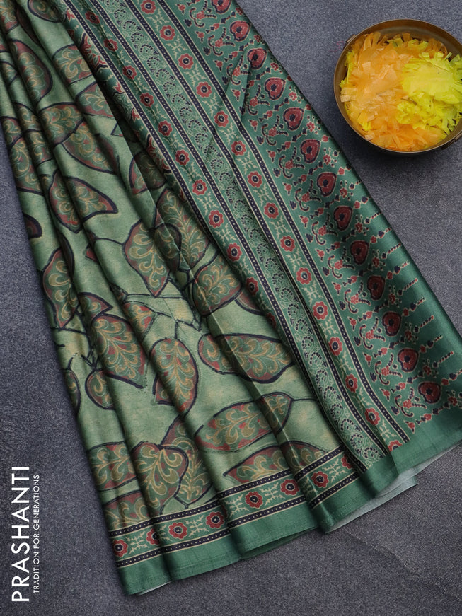 Semi modal saree green shade with allover prints and printed border