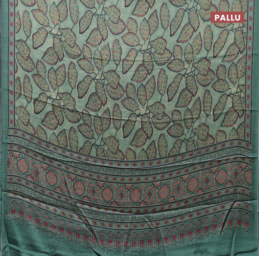 Semi modal saree green shade with allover prints and printed border