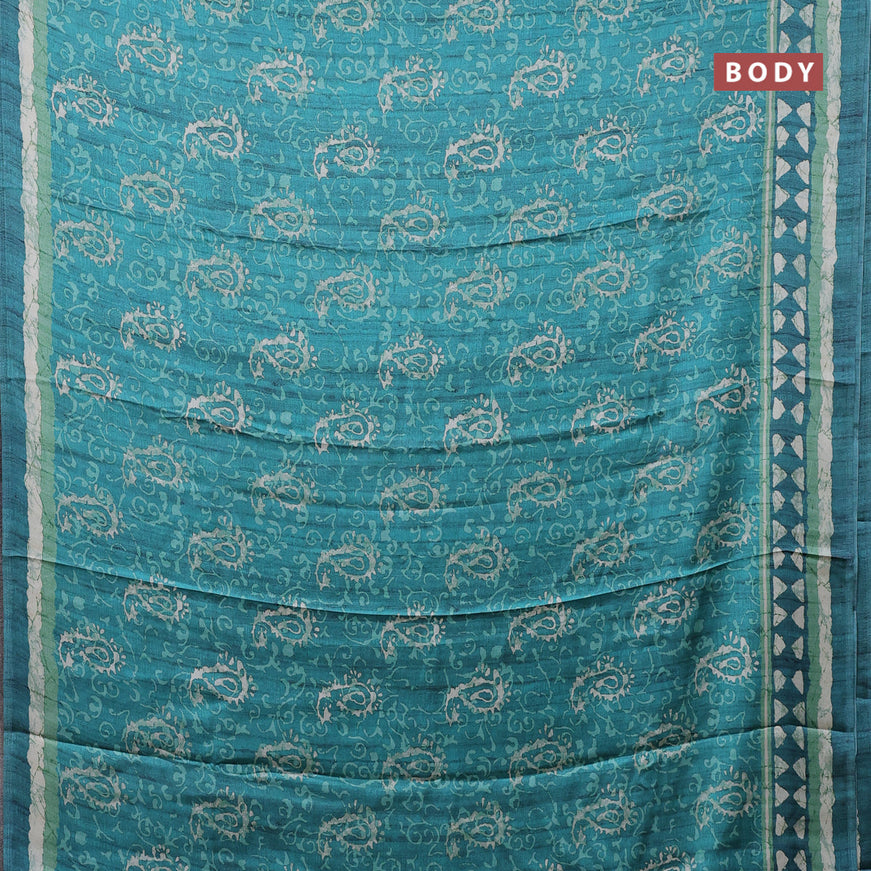 Semi modal saree teal green with allover prints and printed border