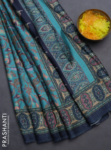 Semi modal saree teal blue with allover prints and printed border