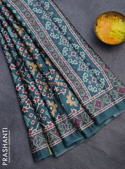 Semi modal saree peacock green with allover patola prints and printed border