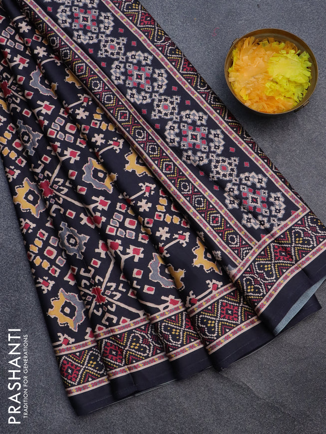 Semi modal saree black with allover patola prints and printed border