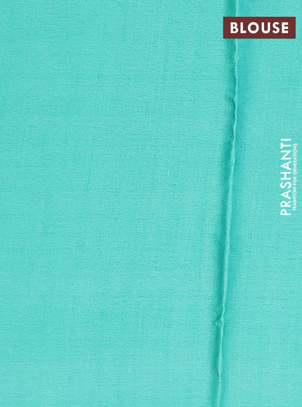 Semi modal saree teal green shade with allover floral prints in borderless style