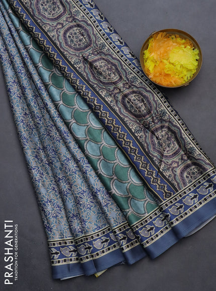 Semi modal saree bluish grey with allover prints and printed border