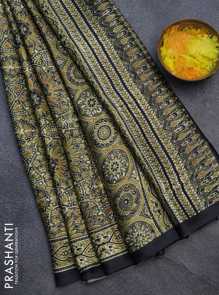 Semi modal saree olive green and black with allover kalamkari prints and printed border